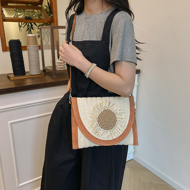 Simple handmade straw woven bag large capacity one-shoulder hand-held beach vacation fashionable versatile crossbody bag